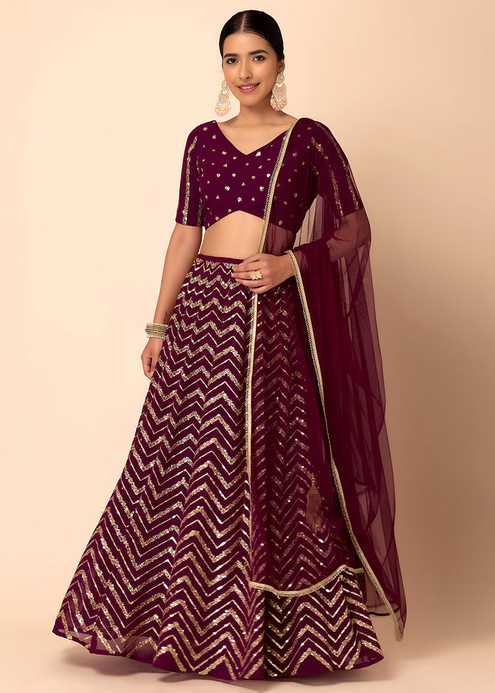 Buy Now Georgette Maroon Zari & Sequins Wedding Festive Lehenga Choli Online in US, UK, Canada, France, Italy, Germany, Australia, Greece & Worldwide at Empress.