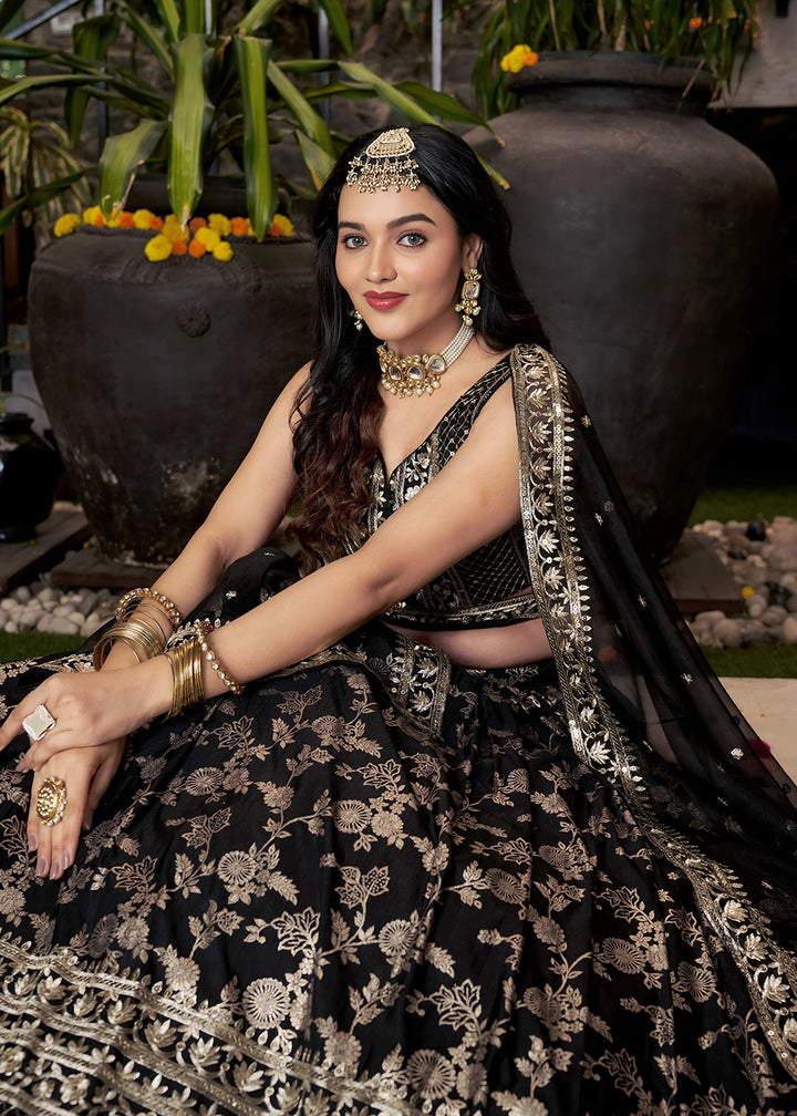 Buy Now Black Dola Silk Jacquard Festive Party Lehenga Choli Online in USA, UK, Canada, France, Italy, Germany, Australia, UAE & Worldwide at Empress Clothing.