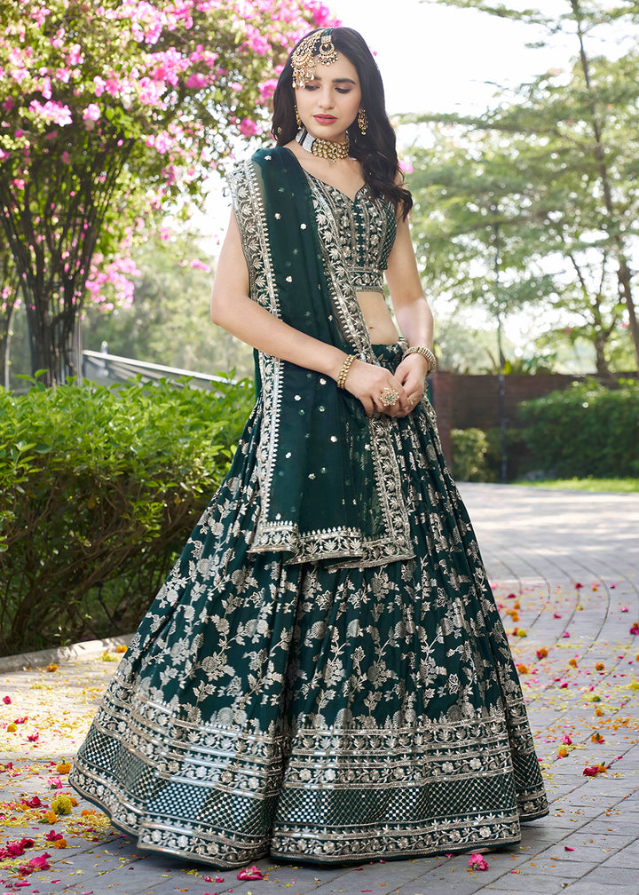 Buy Now Green Dola Silk Jacquard Festive Party Lehenga Choli Online in USA, UK, Canada, France, Italy, Germany, Australia, UAE & Worldwide at Empress Clothing.
