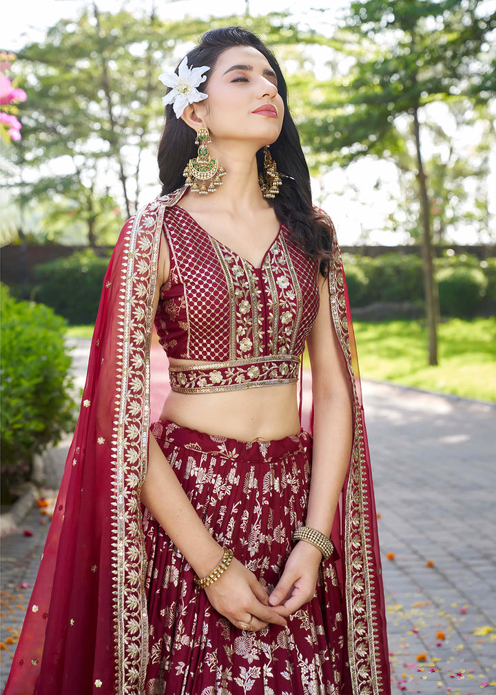 Buy Now Maroon Dola Silk Jacquard Festive Party Lehenga Choli Online in USA, UK, Canada, France, Italy, Germany, Australia, UAE & Worldwide at Empress Clothing.