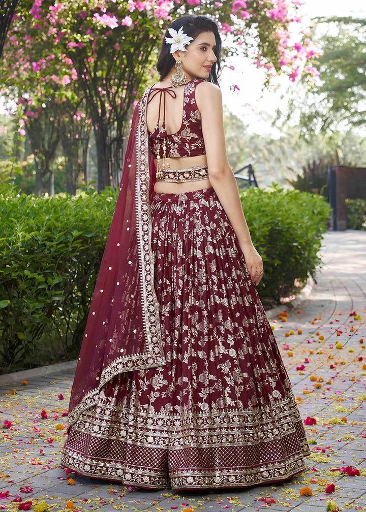 Buy Now Maroon Dola Silk Jacquard Festive Party Lehenga Choli Online in USA, UK, Canada, France, Italy, Germany, Australia, UAE & Worldwide at Empress Clothing.