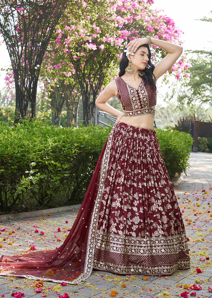 Buy Now Maroon Dola Silk Jacquard Festive Party Lehenga Choli Online in USA, UK, Canada, France, Italy, Germany, Australia, UAE & Worldwide at Empress Clothing.