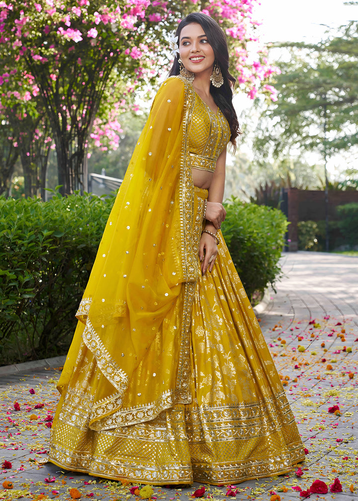 Buy Now Yellow Dola Silk Jacquard Festive Party Lehenga Choli Online in USA, UK, Canada, France, Italy, Germany, Australia, UAE & Worldwide at Empress Clothing.