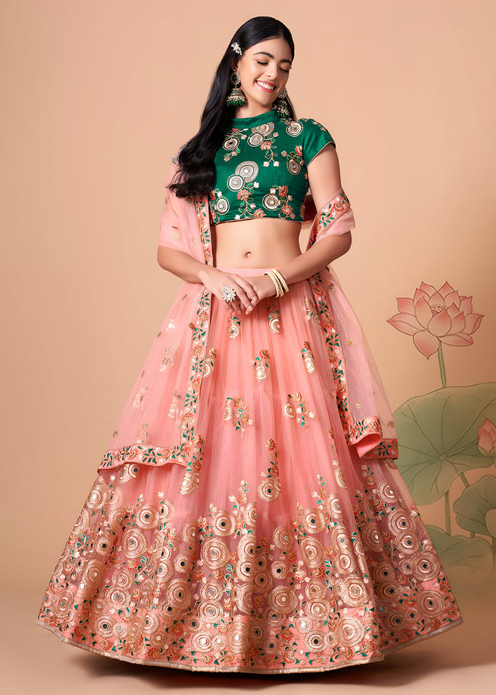 Shop Now Peach &amp; Green Stylish Embroidered A Line Lehenga Choli Online in USA, UK, Canada, France, Germany, Spain, Austria, Sweden, UAE &amp; Worldwide at Empress.