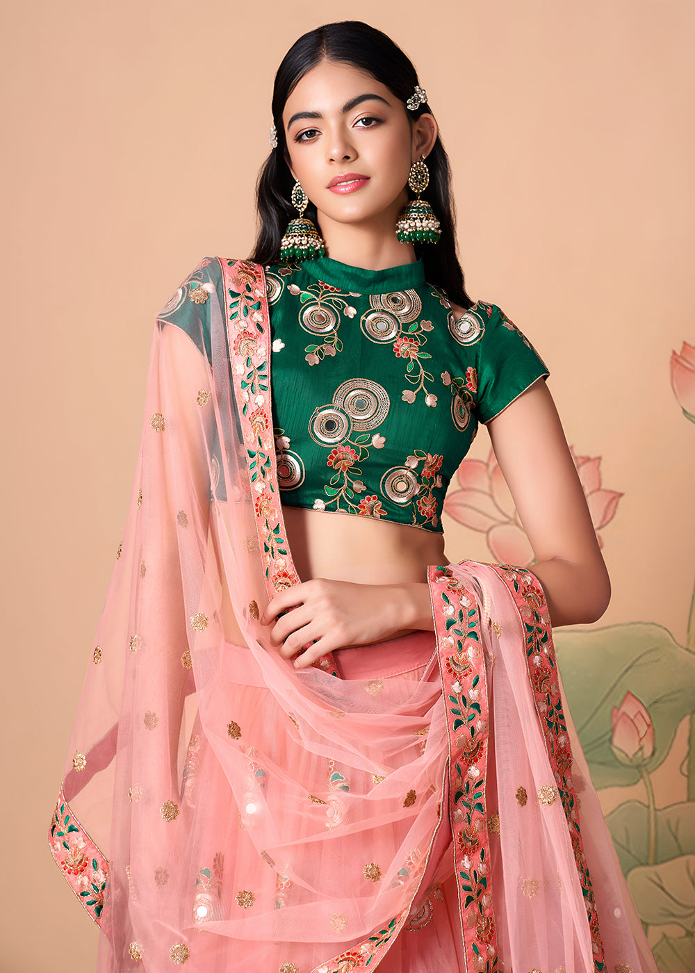 Shop Now Peach &amp; Green Stylish Embroidered A Line Lehenga Choli Online in USA, UK, Canada, France, Germany, Spain, Austria, Sweden, UAE &amp; Worldwide at Empress.