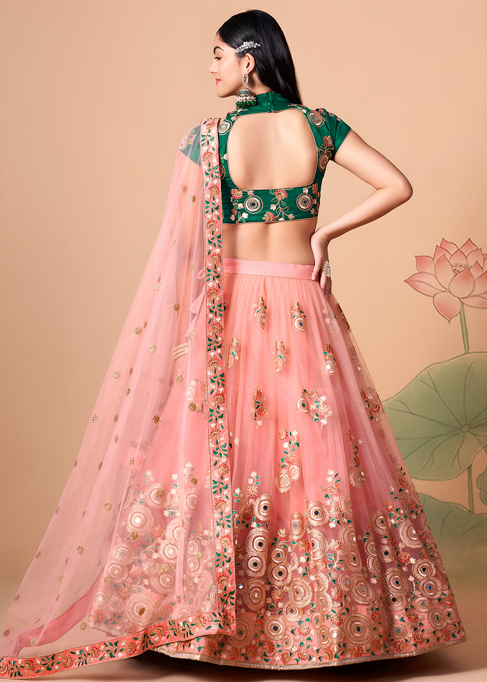 Shop Now Peach &amp; Green Stylish Embroidered A Line Lehenga Choli Online in USA, UK, Canada, France, Germany, Spain, Austria, Sweden, UAE &amp; Worldwide at Empress.