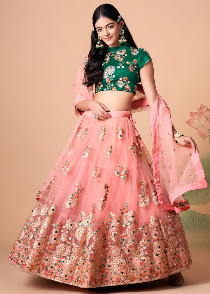 Shop Now Peach &amp; Green Stylish Embroidered A Line Lehenga Choli Online in USA, UK, Canada, France, Germany, Spain, Austria, Sweden, UAE &amp; Worldwide at Empress.