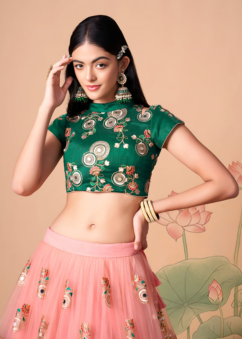 Shop Now Peach &amp; Green Stylish Embroidered A Line Lehenga Choli Online in USA, UK, Canada, France, Germany, Spain, Austria, Sweden, UAE &amp; Worldwide at Empress.
