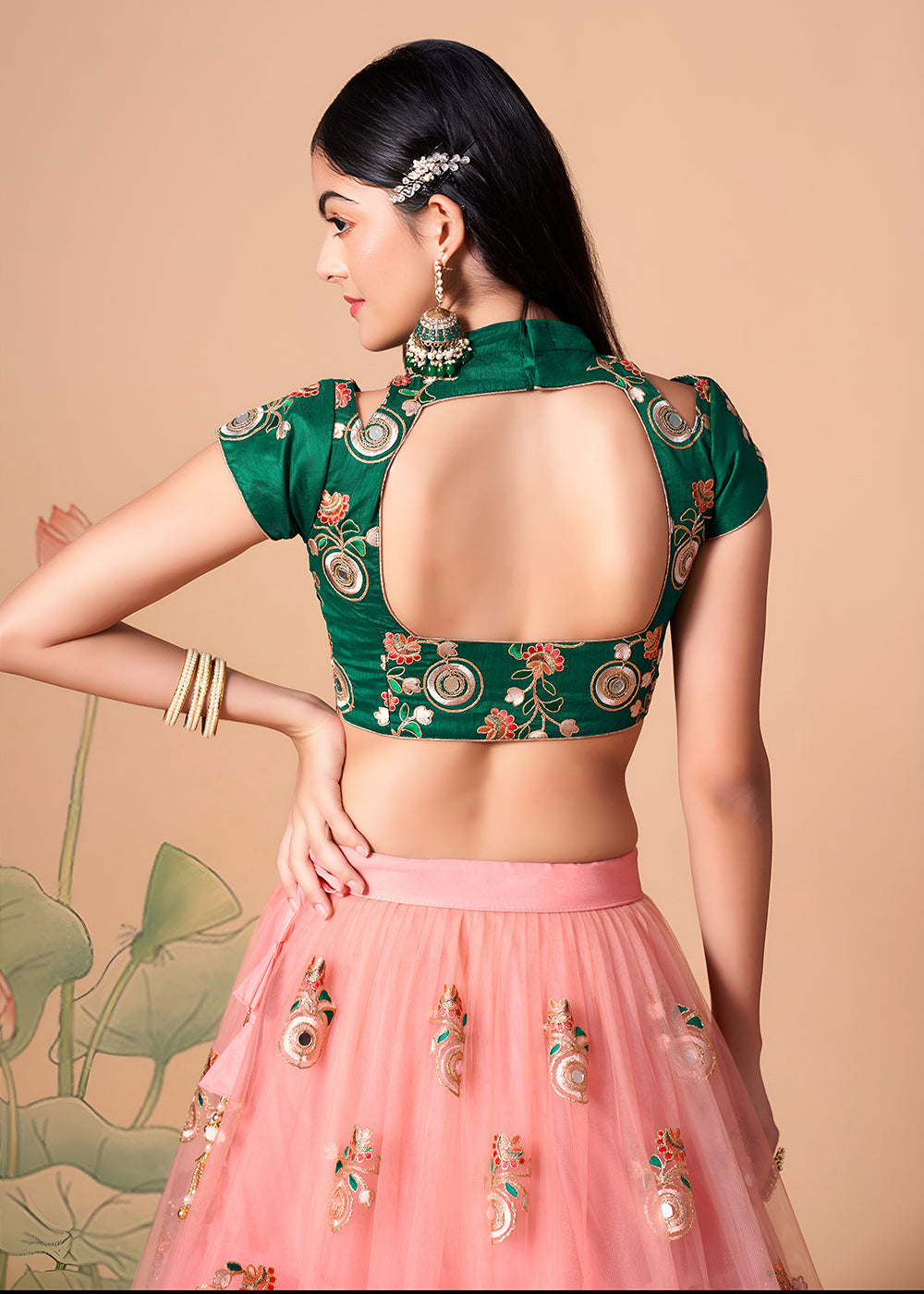 Shop Now Peach &amp; Green Stylish Embroidered A Line Lehenga Choli Online in USA, UK, Canada, France, Germany, Spain, Austria, Sweden, UAE &amp; Worldwide at Empress.