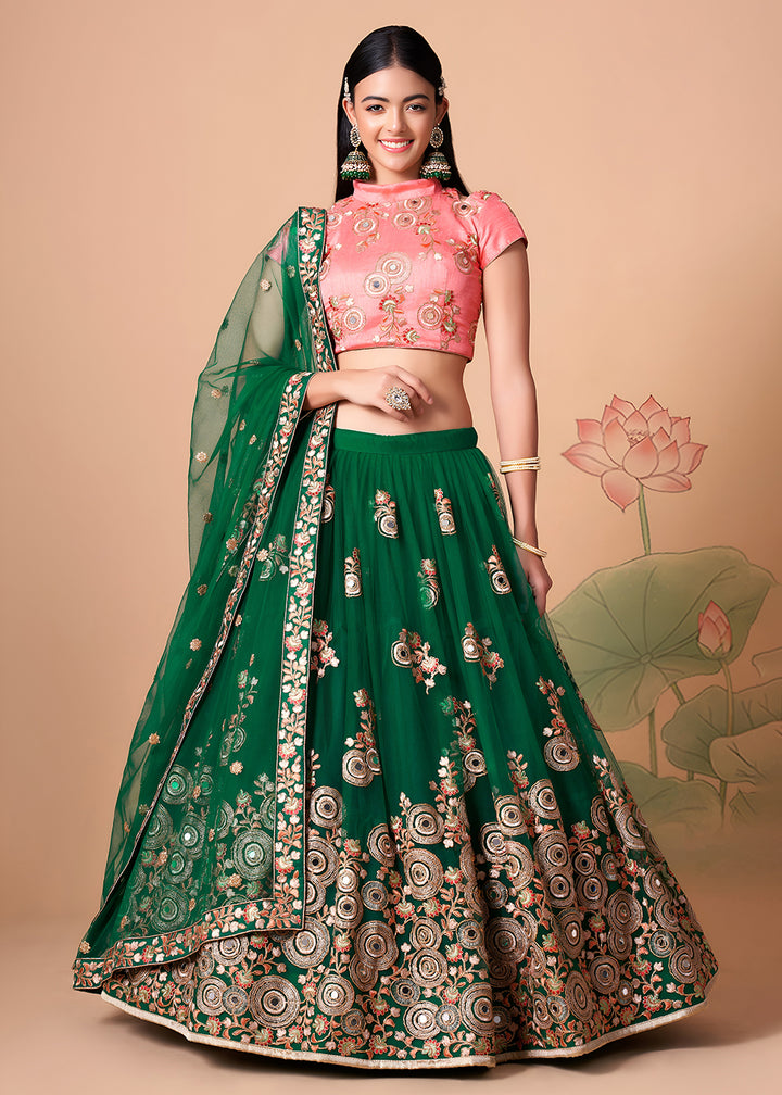 Shop Now Green &amp; Peach Stylish Embroidered A Line Lehenga Choli Online in USA, UK, Canada, France, Germany, Spain, Austria, Sweden, UAE &amp; Worldwide at Empress.