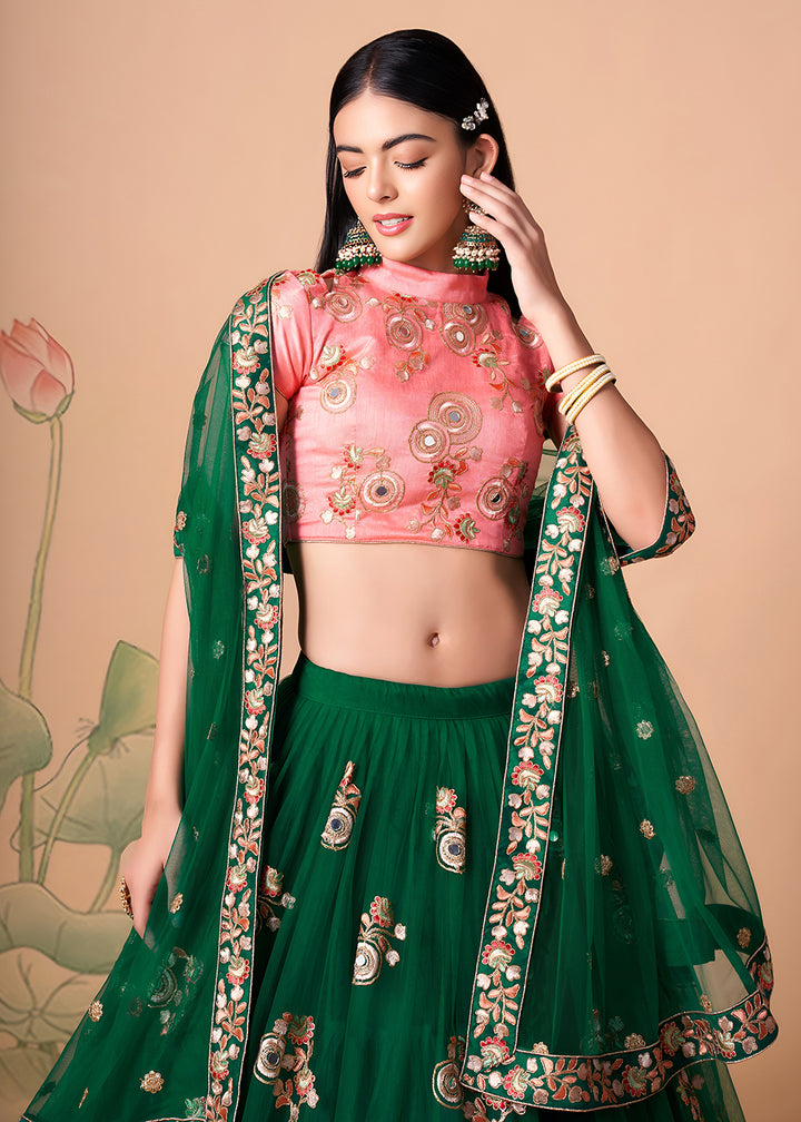 Shop Now Green &amp; Peach Stylish Embroidered A Line Lehenga Choli Online in USA, UK, Canada, France, Germany, Spain, Austria, Sweden, UAE &amp; Worldwide at Empress.