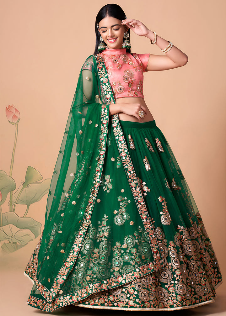 Shop Now Green &amp; Peach Stylish Embroidered A Line Lehenga Choli Online in USA, UK, Canada, France, Germany, Spain, Austria, Sweden, UAE &amp; Worldwide at Empress.