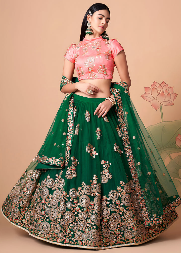 Shop Now Green &amp; Peach Stylish Embroidered A Line Lehenga Choli Online in USA, UK, Canada, France, Germany, Spain, Austria, Sweden, UAE &amp; Worldwide at Empress.