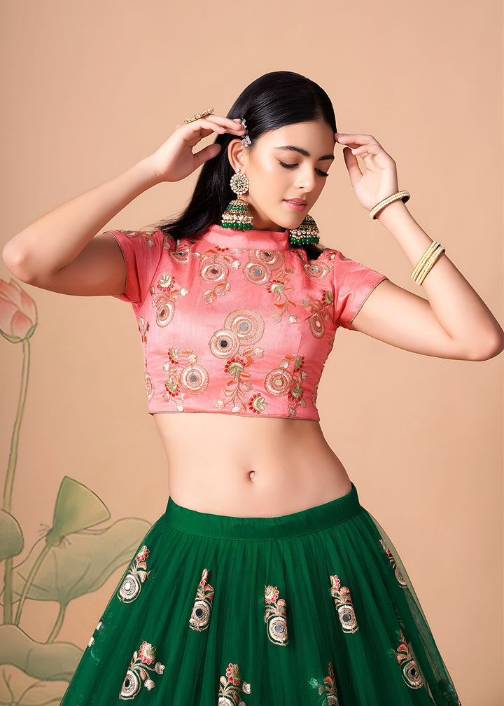 Shop Now Green &amp; Peach Stylish Embroidered A Line Lehenga Choli Online in USA, UK, Canada, France, Germany, Spain, Austria, Sweden, UAE &amp; Worldwide at Empress.