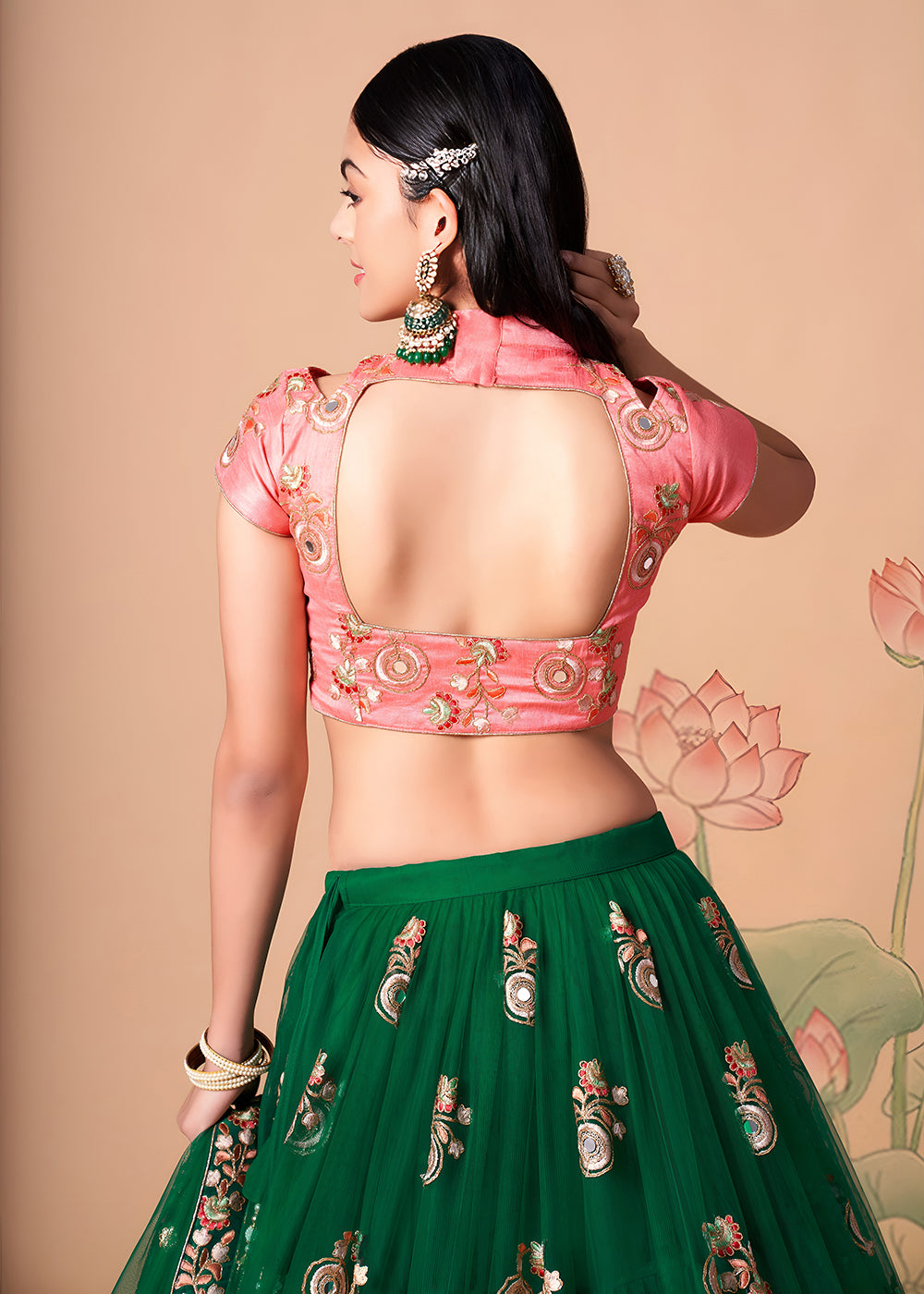 Shop Now Green &amp; Peach Stylish Embroidered A Line Lehenga Choli Online in USA, UK, Canada, France, Germany, Spain, Austria, Sweden, UAE &amp; Worldwide at Empress.