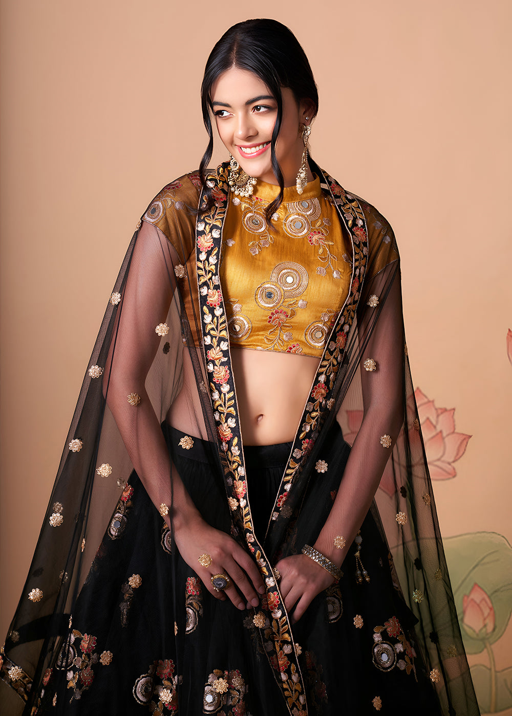 Shop Now Black & Gold Stylish Embroidered A Line Lehenga Choli Online in USA, UK, Canada, France, Germany, Spain, Austria, Sweden, UAE & Worldwide at Empress.