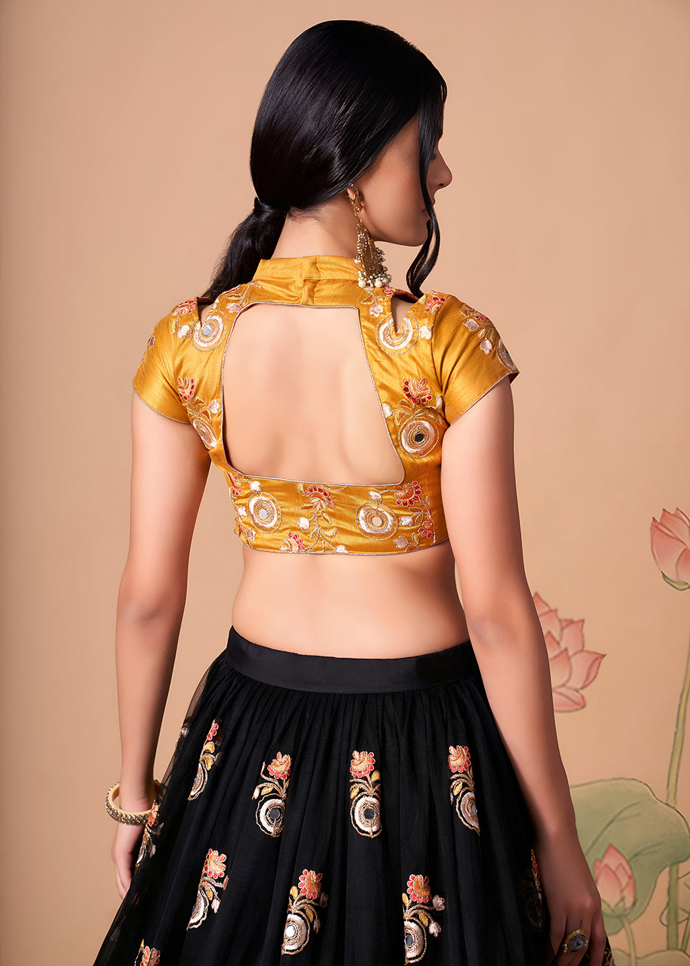 Shop Now Black &amp; Gold Stylish Embroidered A Line Lehenga Choli Online in USA, UK, Canada, France, Germany, Spain, Austria, Sweden, UAE &amp; Worldwide at Empress.
