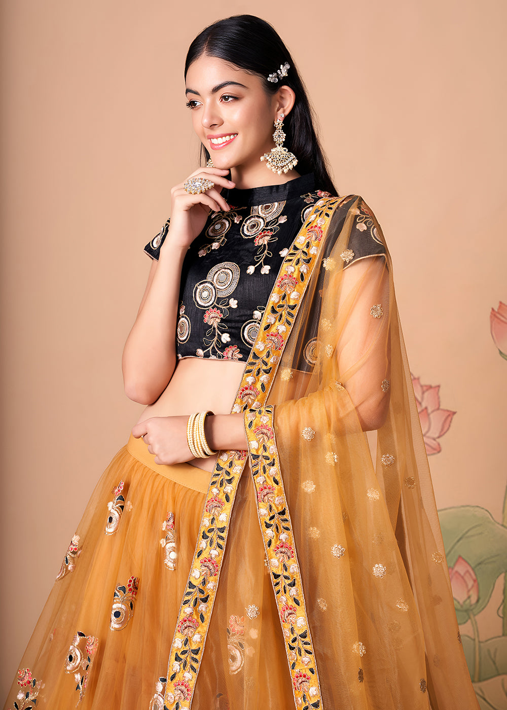 Shop Now Gold & Black Stylish Embroidered A Line Lehenga Choli Online in USA, UK, Canada, France, Germany, Spain, Austria, Sweden, UAE & Worldwide at Empress.