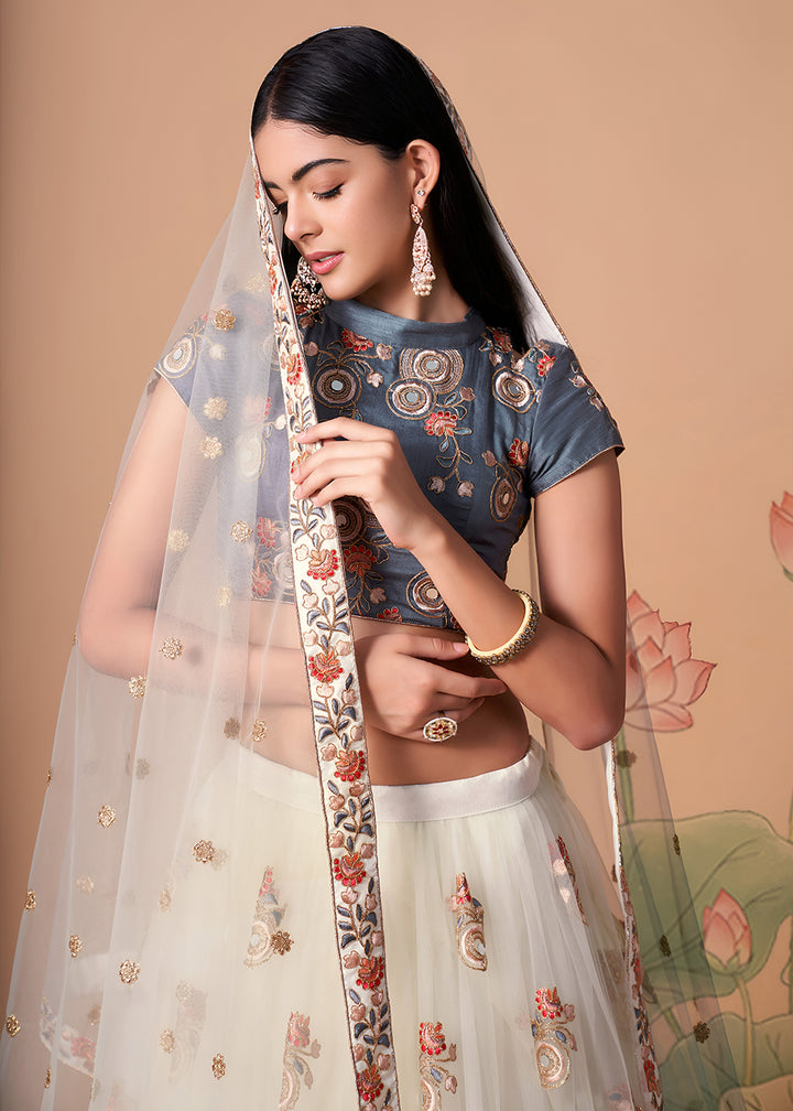 Shop Now Off White &amp; Grey Stylish Embroidered A Line Lehenga Choli Online in USA, UK, Canada, France, Germany, Spain, Austria, Sweden, UAE &amp; Worldwide at Empress.