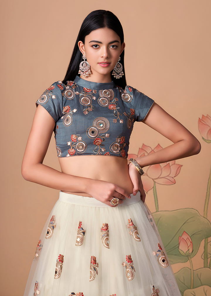 Shop Now Off White &amp; Grey Stylish Embroidered A Line Lehenga Choli Online in USA, UK, Canada, France, Germany, Spain, Austria, Sweden, UAE &amp; Worldwide at Empress.