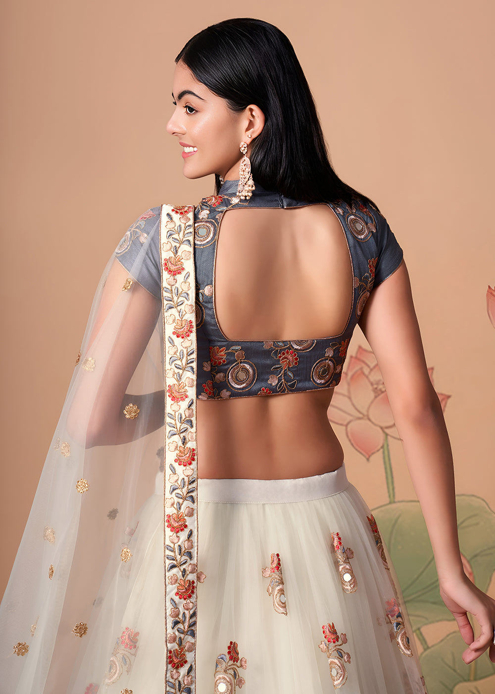 Shop Now Off White &amp; Grey Stylish Embroidered A Line Lehenga Choli Online in USA, UK, Canada, France, Germany, Spain, Austria, Sweden, UAE &amp; Worldwide at Empress.