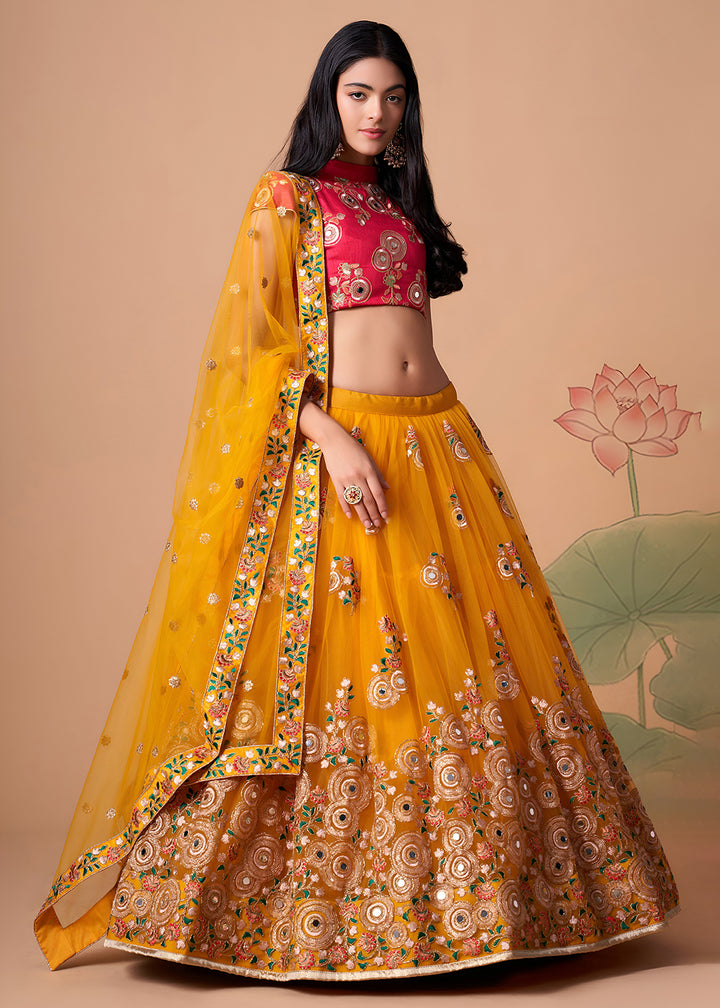 Shop Now Yellow &amp; Rani Stylish Embroidered A Line Lehenga Choli Online in USA, UK, Canada, France, Germany, Spain, Austria, Sweden, UAE &amp; Worldwide at Empress.