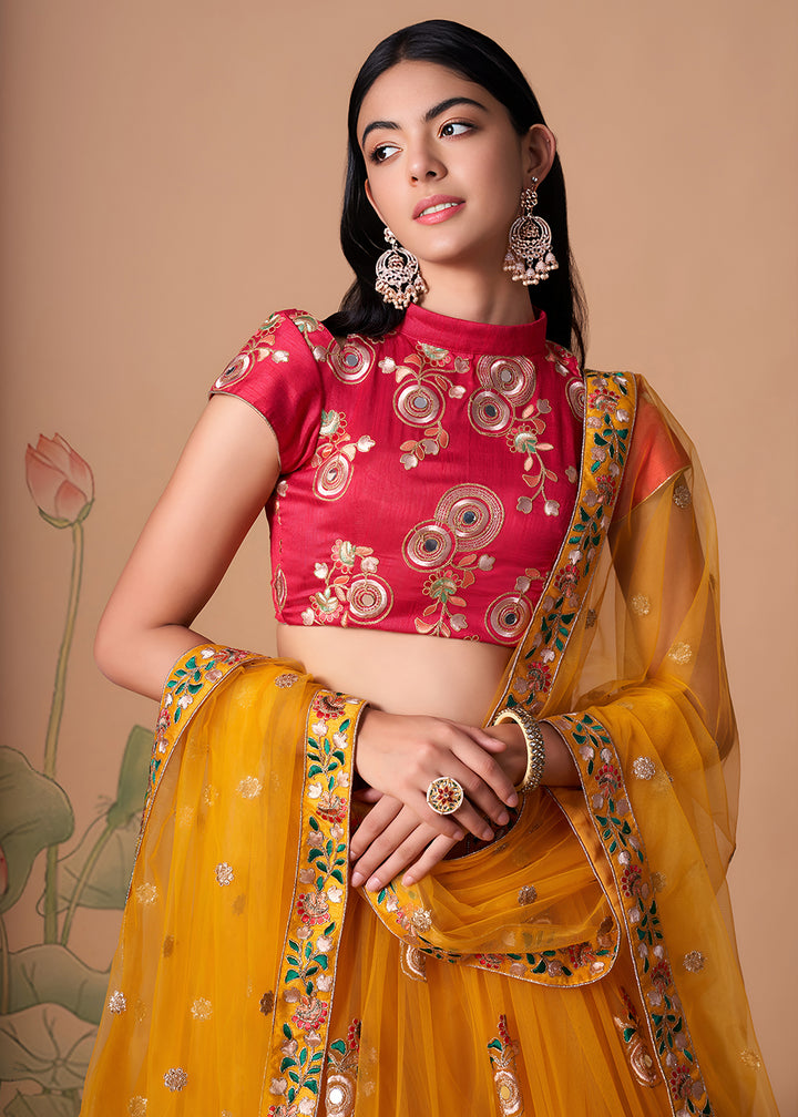 Shop Now Yellow &amp; Rani Stylish Embroidered A Line Lehenga Choli Online in USA, UK, Canada, France, Germany, Spain, Austria, Sweden, UAE &amp; Worldwide at Empress.