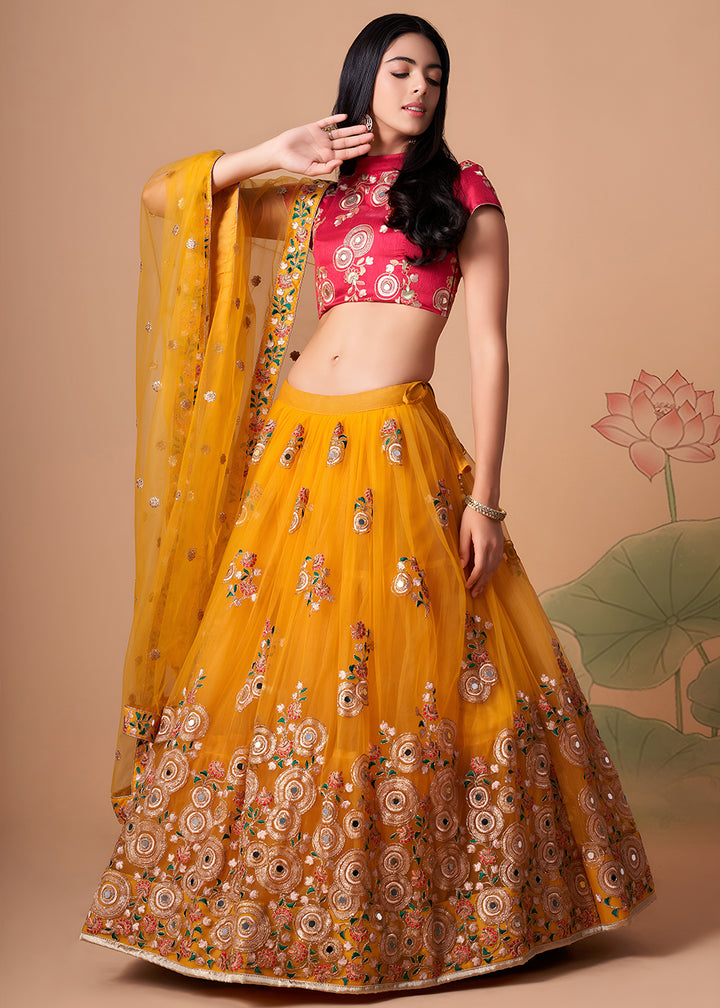 Shop Now Yellow &amp; Rani Stylish Embroidered A Line Lehenga Choli Online in USA, UK, Canada, France, Germany, Spain, Austria, Sweden, UAE &amp; Worldwide at Empress.