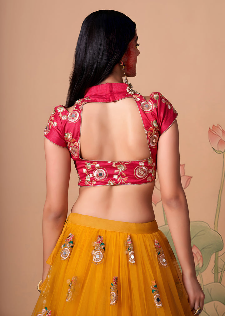 Shop Now Yellow &amp; Rani Stylish Embroidered A Line Lehenga Choli Online in USA, UK, Canada, France, Germany, Spain, Austria, Sweden, UAE &amp; Worldwide at Empress.