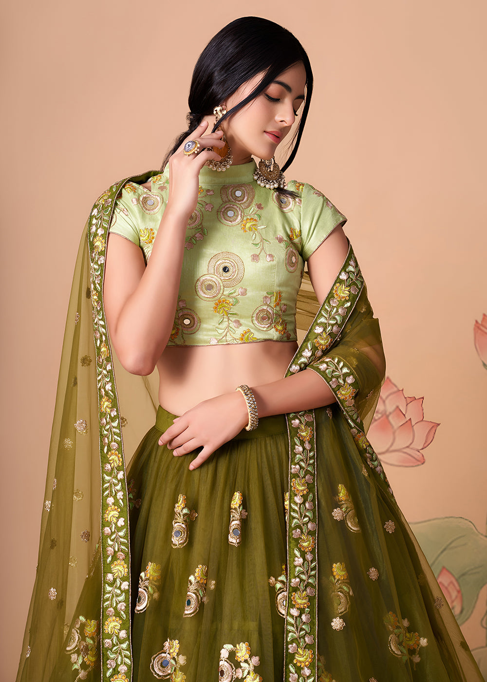 Shop Now Mehndi & Pista Stylish Embroidered A Line Lehenga Choli Online in USA, UK, Canada, France, Germany, Spain, Austria, Sweden, UAE & Worldwide at Empress.