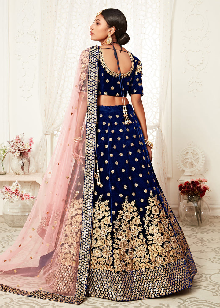 Buy Now Trendy Blue Velvet Embroidered Wedding Lehenga Choli Online in USA, UK, Canada & Worldwide at Empress Clothing. 