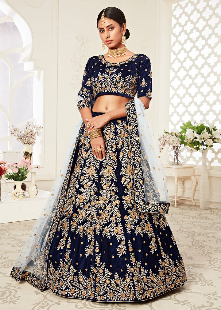 Buy Now Trendy Navy Blue Velvet Embroidered Wedding Lehenga Choli Online in USA, UK, Canada & Worldwide at Empress Clothing. 