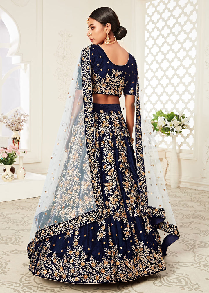 Buy Now Trendy Navy Blue Velvet Embroidered Wedding Lehenga Choli Online in USA, UK, Canada & Worldwide at Empress Clothing. 