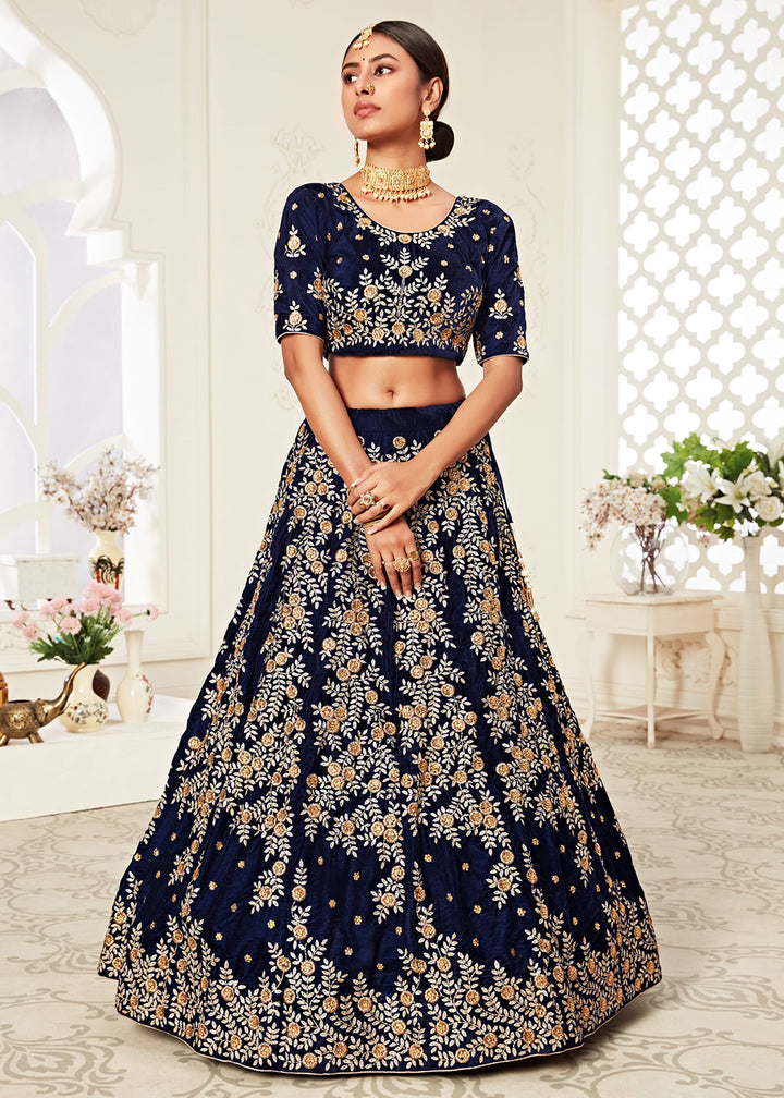 Buy Now Trendy Navy Blue Velvet Embroidered Wedding Lehenga Choli Online in USA, UK, Canada & Worldwide at Empress Clothing. 