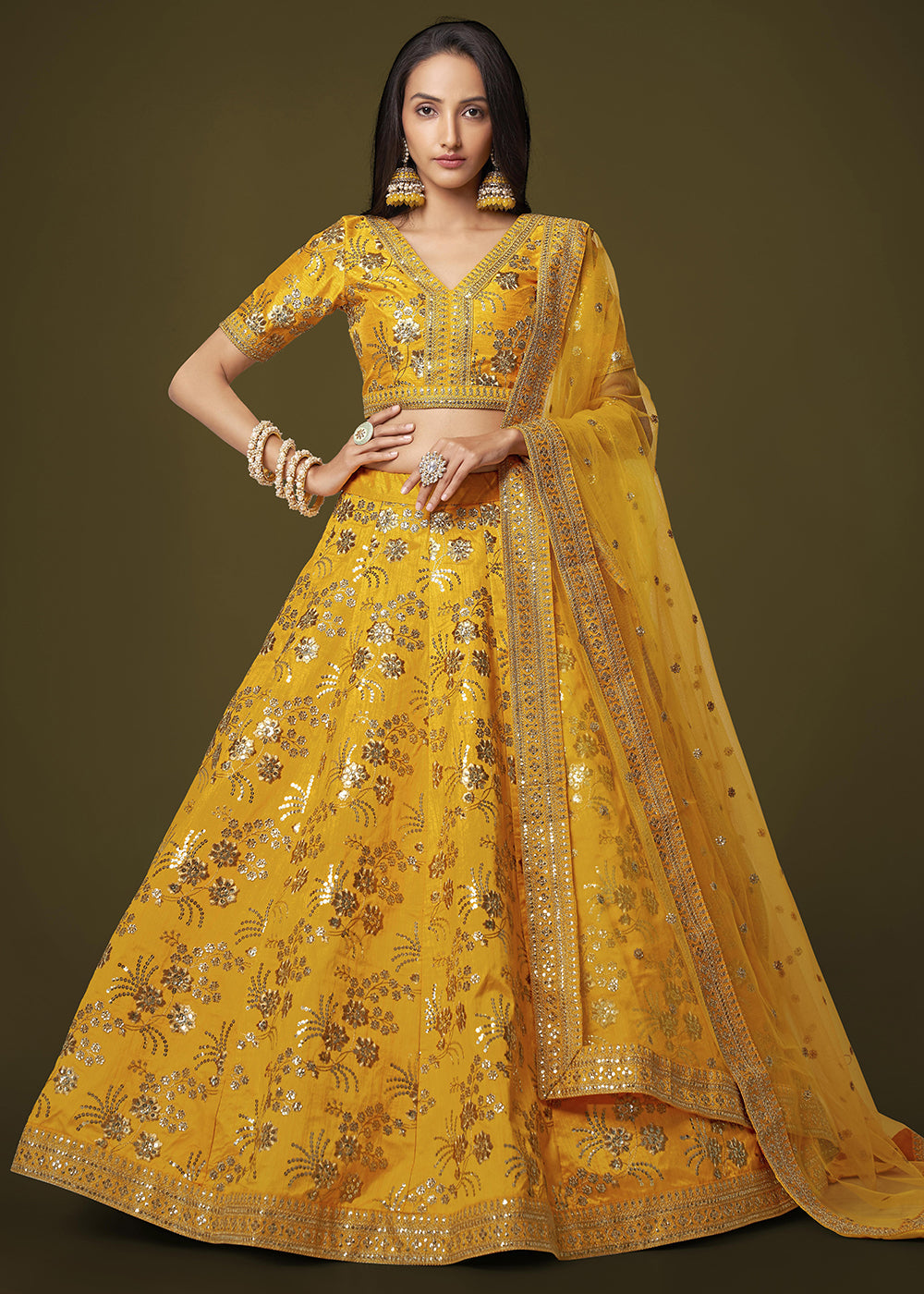 Buy Now Sequins & Zari Embroidered Yellow Silk Designer Lehenga Choli Online in USA, UK, Canada & Worldwide at Empress Clothing.