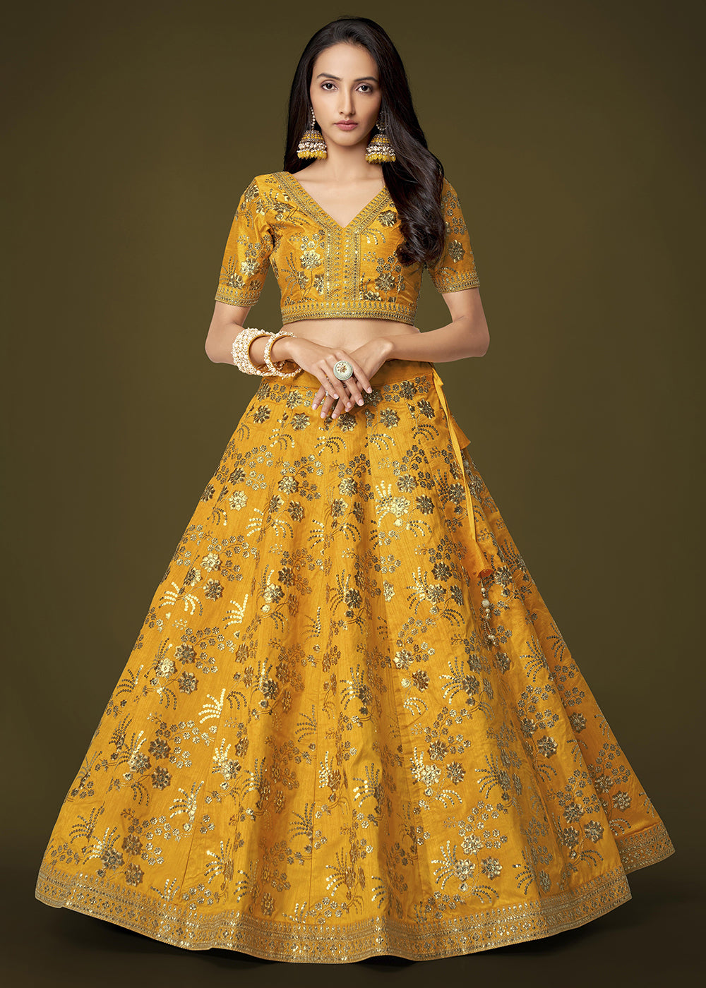 Buy Now Sequins & Zari Embroidered Yellow Silk Designer Lehenga Choli Online in USA, UK, Canada & Worldwide at Empress Clothing.