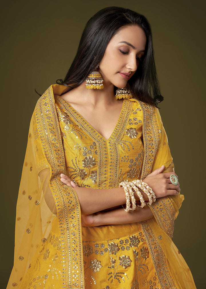 Buy Now Sequins & Zari Embroidered Yellow Silk Designer Lehenga Choli Online in USA, UK, Canada & Worldwide at Empress Clothing.