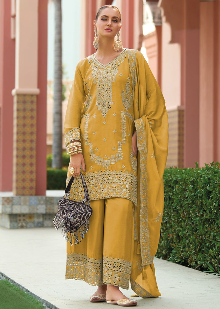 Buy Now Festive Style Chinnon Mustard Embroidered Palazzo Suit Online in USA, UK, Canada, Germany, Italy, France, Austria, UAE & Worldwide at Empress Clothing.