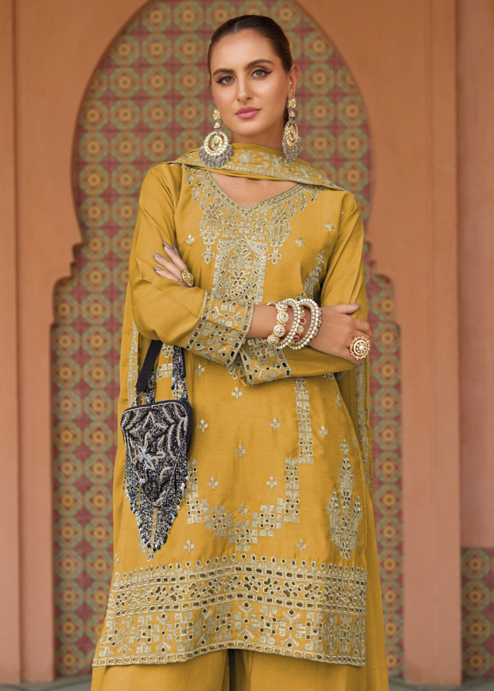 Buy Now Festive Style Chinnon Mustard Embroidered Palazzo Suit Online in USA, UK, Canada, Germany, Italy, France, Austria, UAE & Worldwide at Empress Clothing.