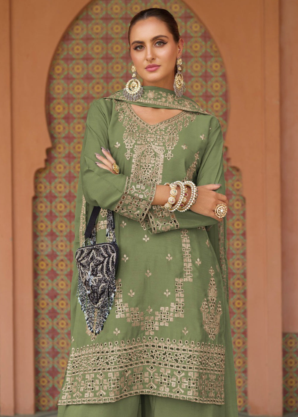 Buy Now Festive Style Chinnon Green Embroidered Palazzo Suit Online in USA, UK, Canada, Germany, Italy, France, Austria, UAE & Worldwide at Empress Clothing.