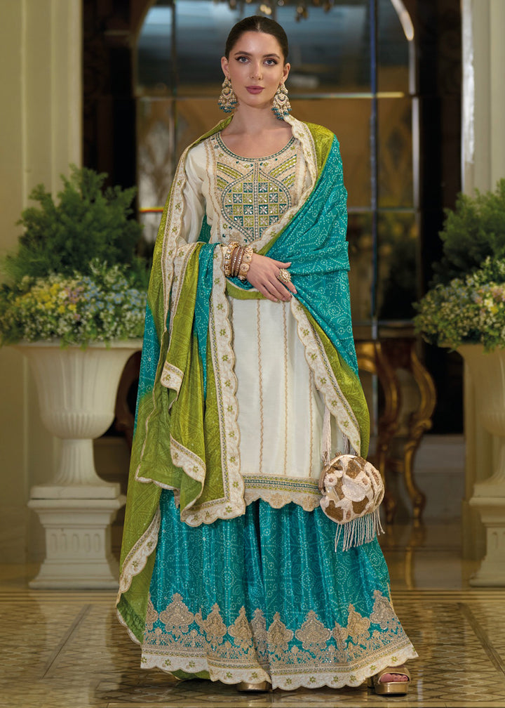 Buy Now Festive Style White & Blue Embroidered Palazzo Suit Online in USA, UK, Canada, Germany, Italy, France, Austria, UAE & Worldwide at Empress Clothing.