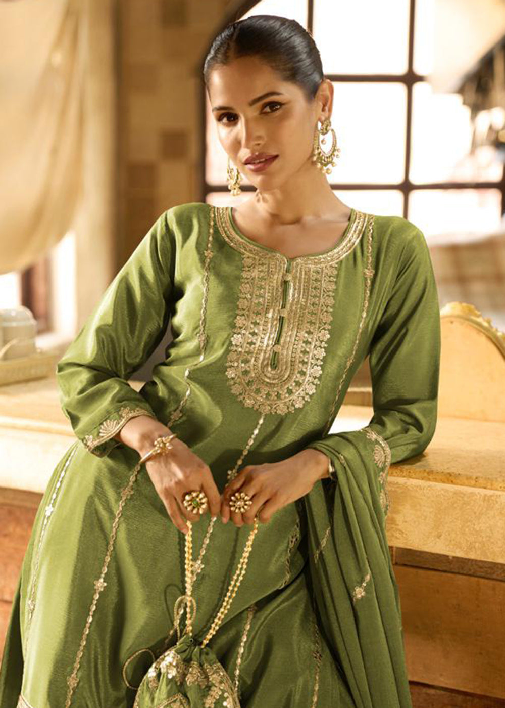 Buy Now Green Chinnon Silk Function & Festive Palazzo Suit Online in Newark, Yorktown, Toronto, London, Orlando, Munich, Chicago, Greece & Worldwide at Empress.