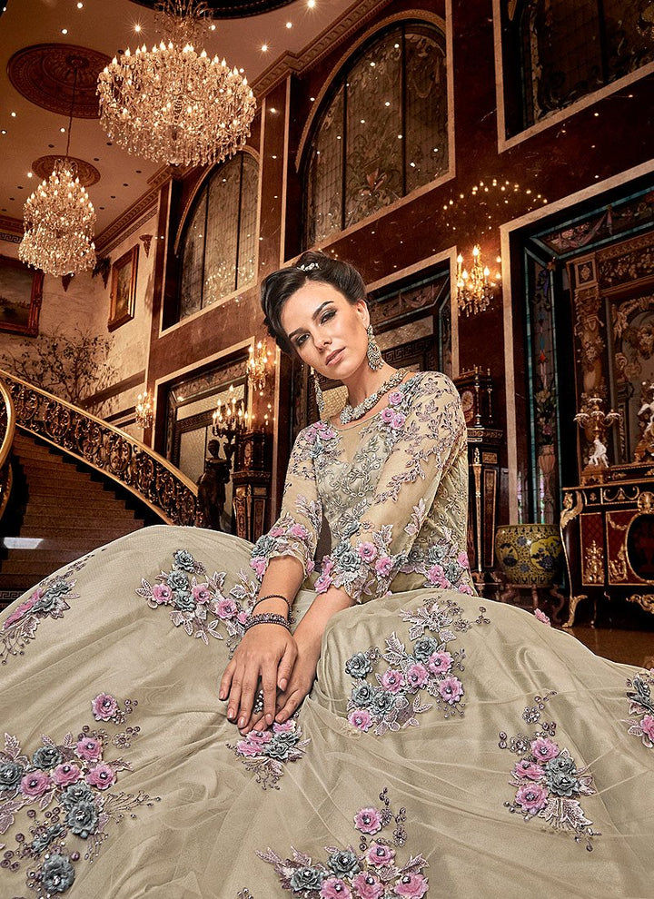 Beauteous Beige Floral Embroidered Designer Net Anarkali Suit