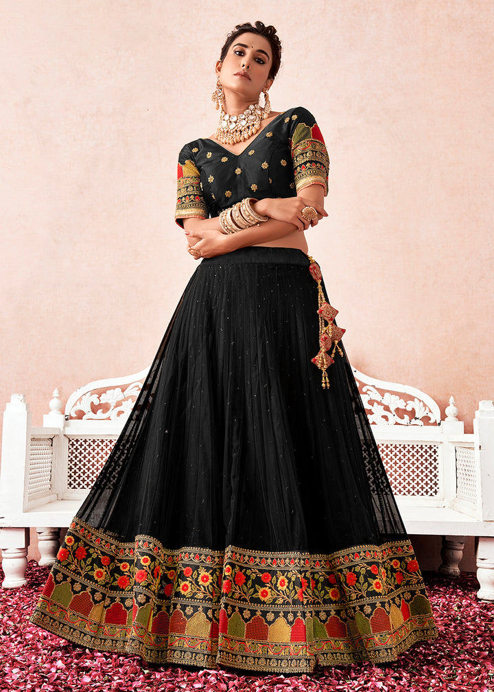 Buy Now Traditional Regal Black Kalidar Embroidered Net Lehenga Choli Online in USA, UK, Canada & Worldwide at Empress Clothing. 