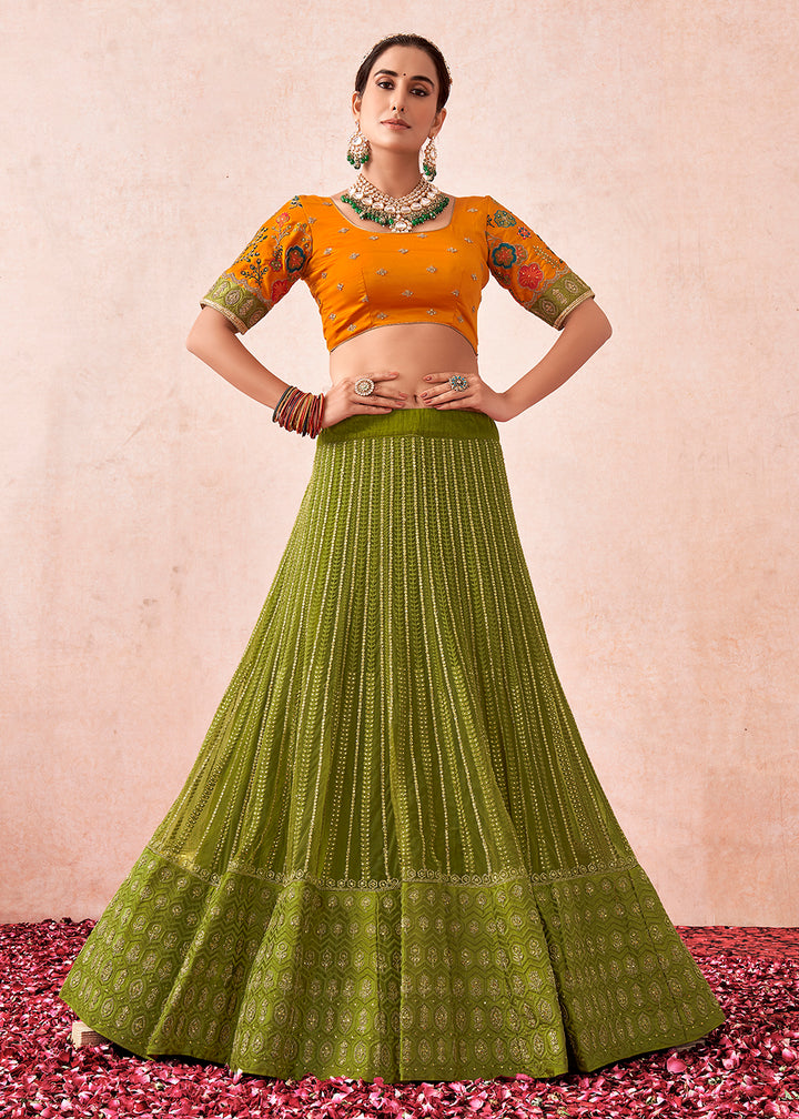 Buy Now Traditional Olive Green Kalidar Embroidered Net Lehenga Choli Online in USA, UK, Canada & Worldwide at Empress Clothing. 