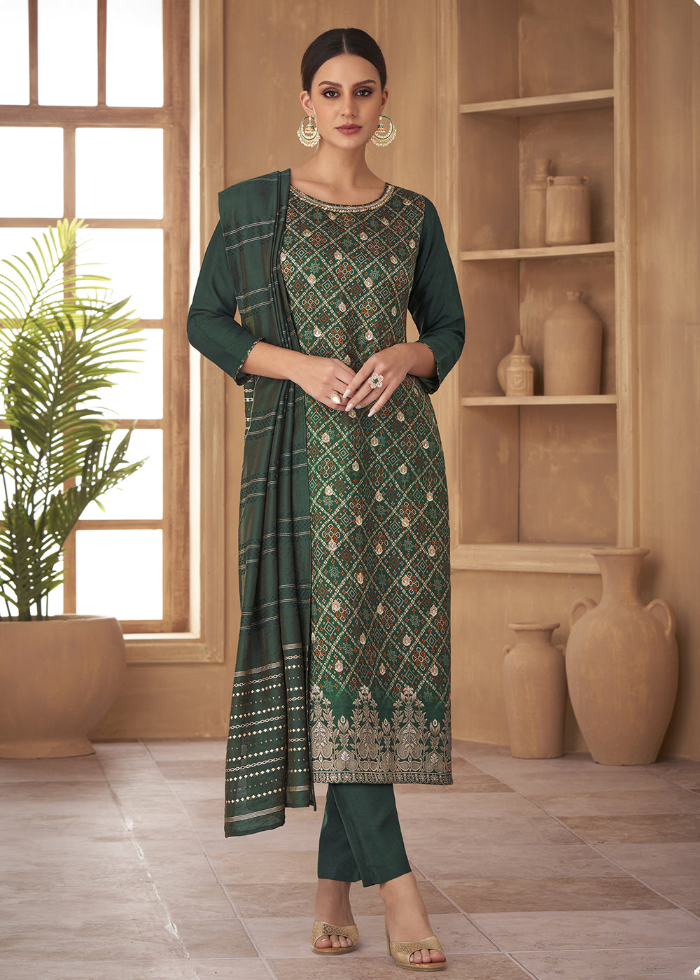 Buy Now Tempting Green Russian Silk Embroidered Pant Style Salwar Suit Online in USA, UK, Canada, Germany, Australia & Worldwide at Empress Clothing.