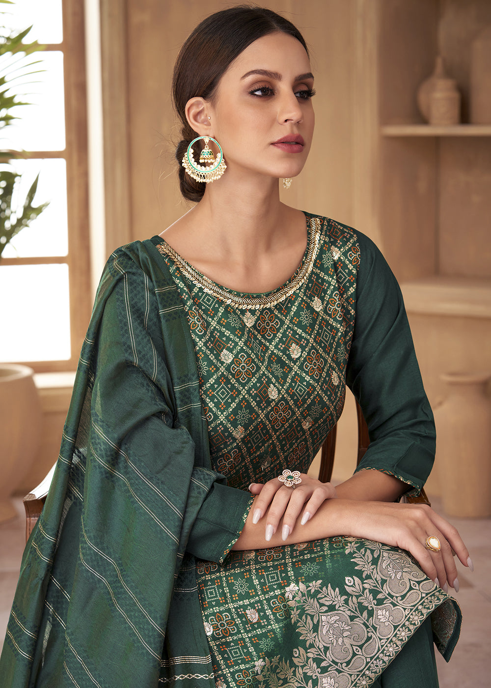 Buy Now Tempting Green Russian Silk Embroidered Pant Style Salwar Suit Online in USA, UK, Canada, Germany, Australia & Worldwide at Empress Clothing.