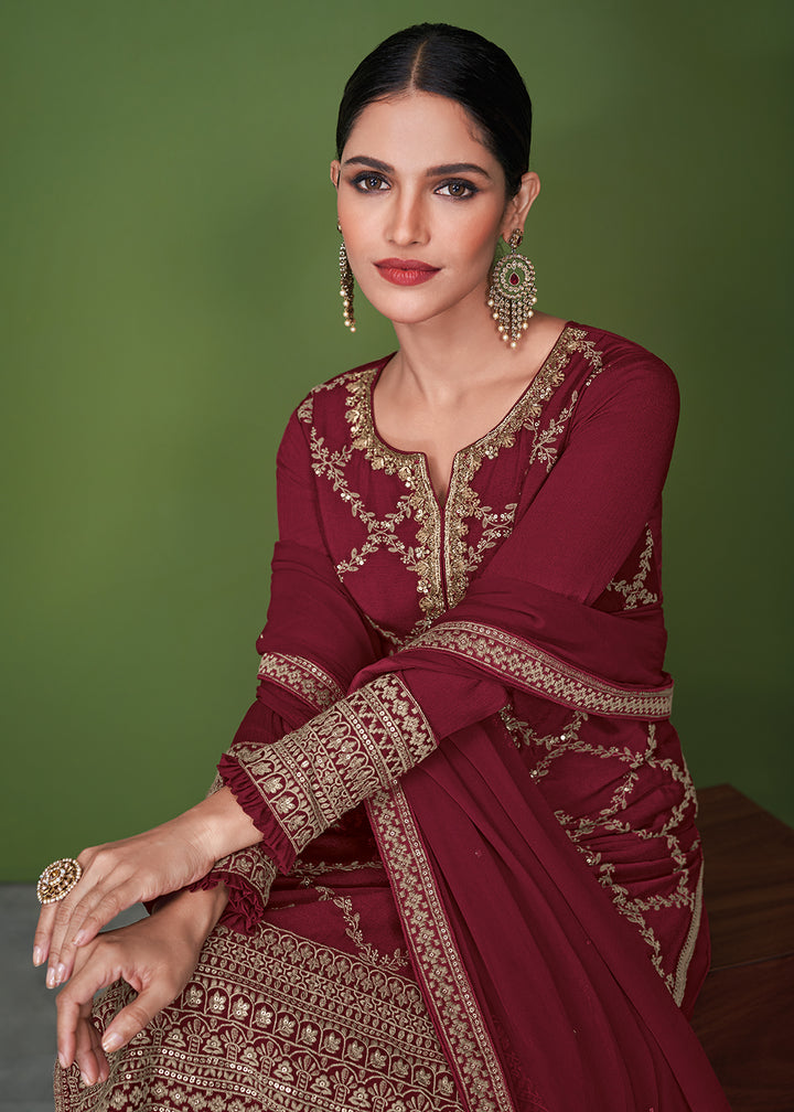 Buy Now Stunning Maroon Beautifully Embroidered Festive Palazzo Salwar Suit Online in USA, UK, Canada, Germany & Worldwide at Empress Clothing.