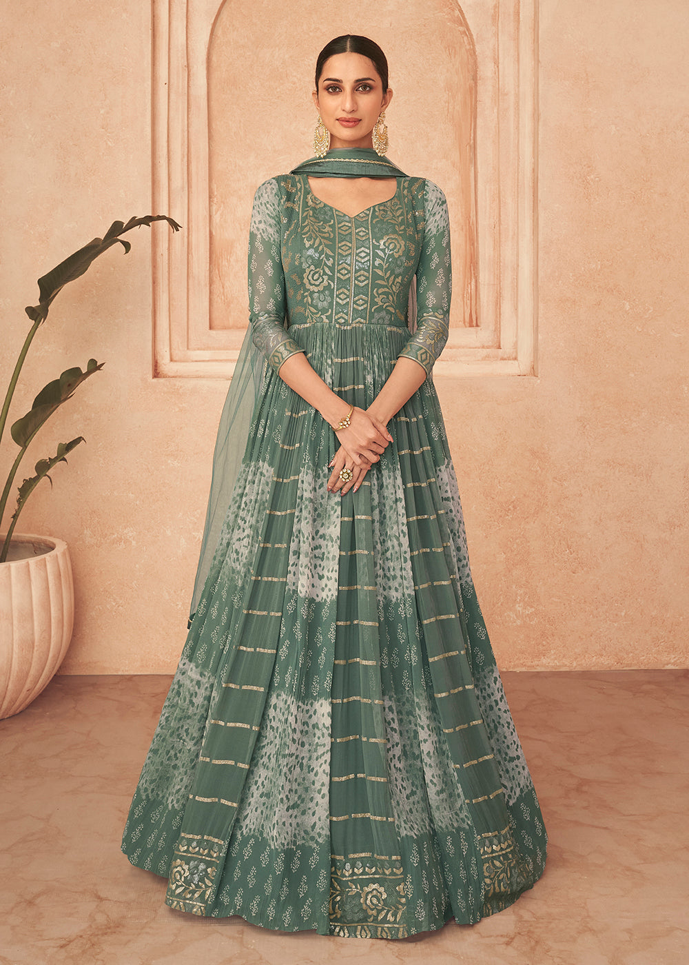 Buy Now Adorning Green Georgette Embroidered Wedding Wear Gown Online in USA, UK, Australia, New Zealand, Canada & Worldwide at Empress Clothing. 
