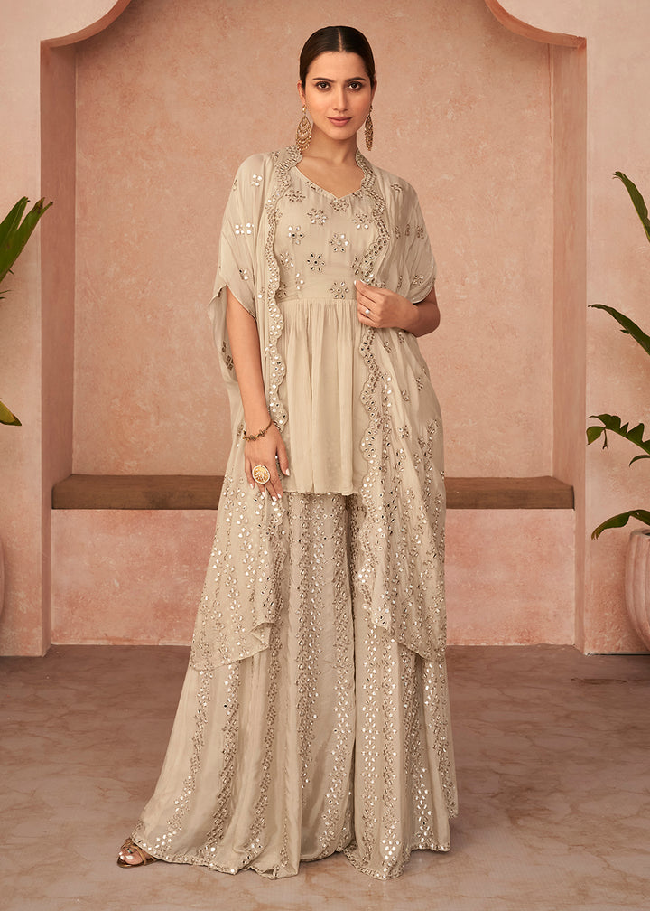 Buy Now Designer Creamy Beige Jacket Style Kurti Style Palazzo Suit Online in USA, UK, Canada, Germany & Worldwide at Empress Clothing. 